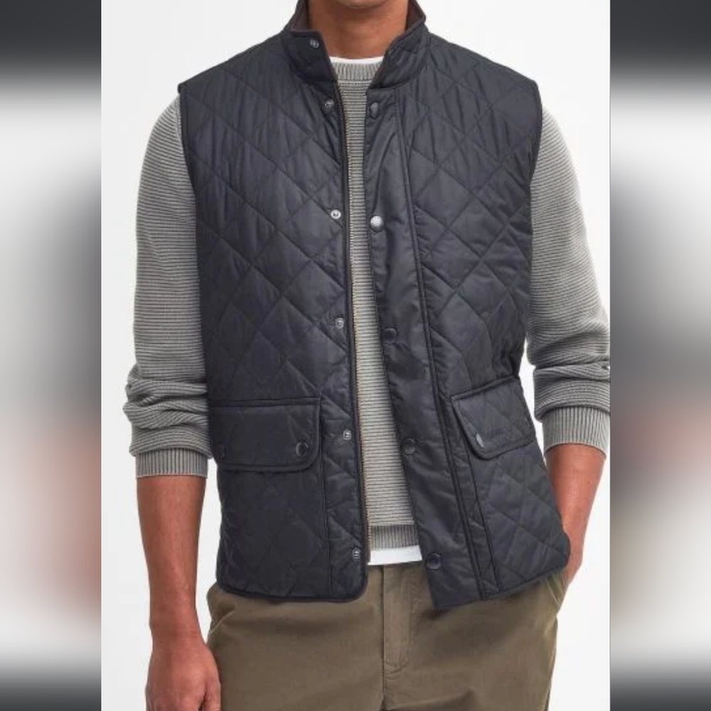 Navy Barbour quilted vest in an XXL.